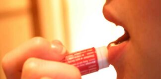 Girl applying Lip balm