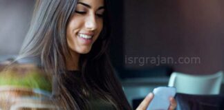 girl using smartphone on the table