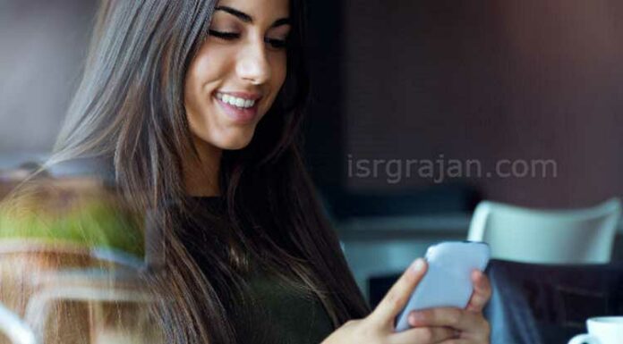 girl using smartphone on the table