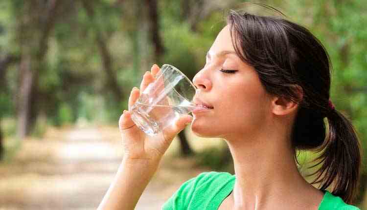 Beautiful Indian Girl Drinking Water