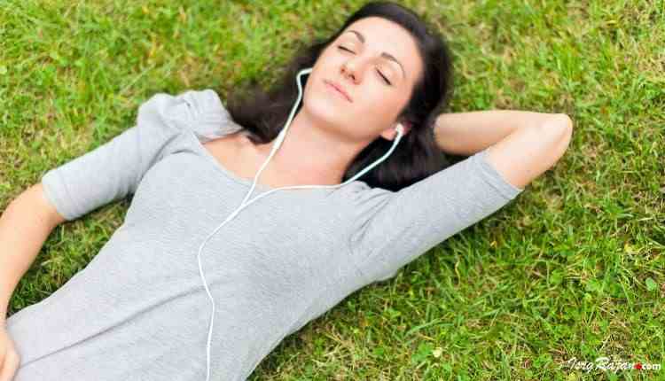 music and mood girl lying on grass