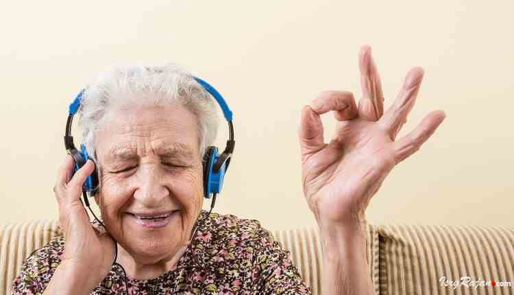 Old woman with headphone