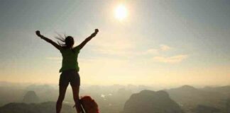 Girl standing on hill