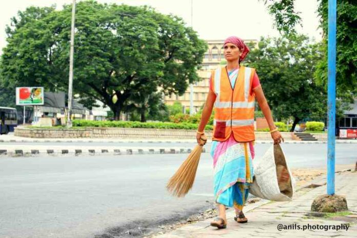 Indian street sweeper