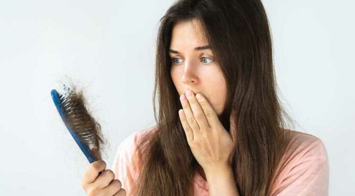 Young Woman Is Upset Because Of Hair Loss