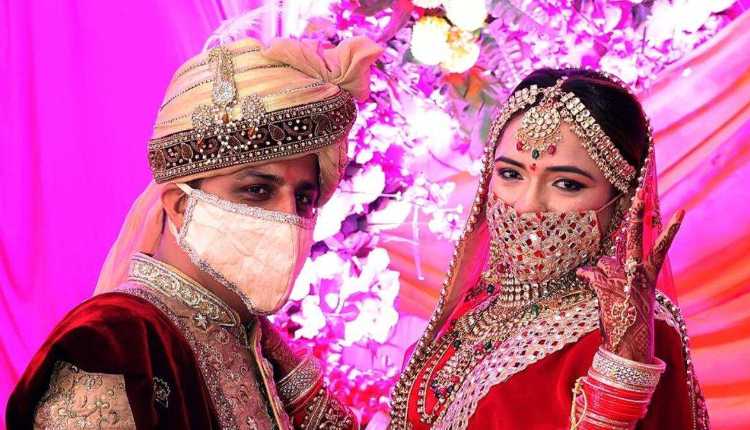 Indian Groom And Bride In Mask