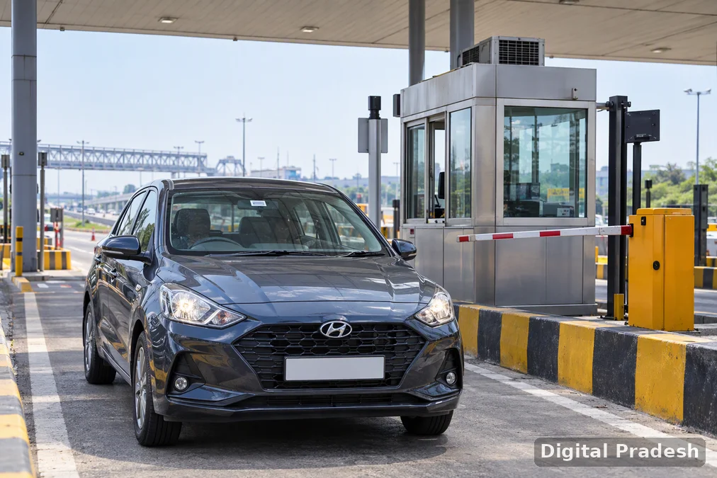 Vehicles pass through a national highway toll plaza in India.